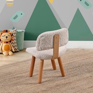 Cozy kids Sherpa chair, perfect for snuggles and relaxation. Plush, soft, and inviting, a comfy addition to any child's room or play area.