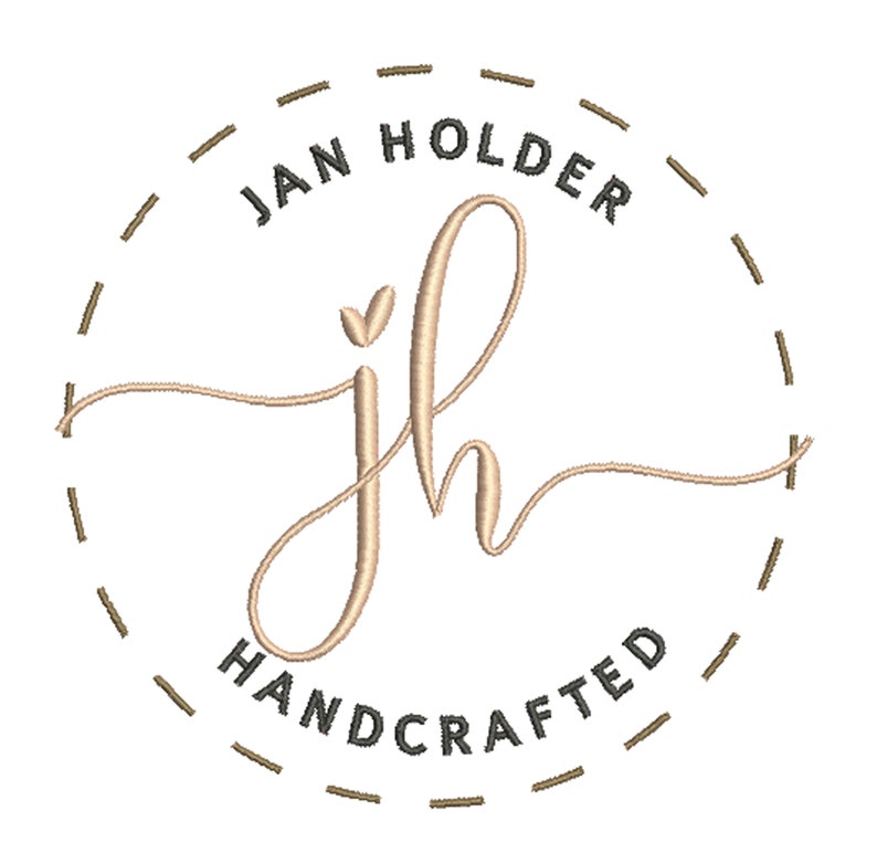 May include: A logo with the text "Jan Holder Handcrafted" in a circle with a dashed line border. The letters "jh" are in a cursive font with a heart in the center of the "j".