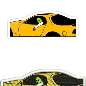 May include: A yellow car with a black interior and a green masked figure driving. The car is outlined in white and has a white background.