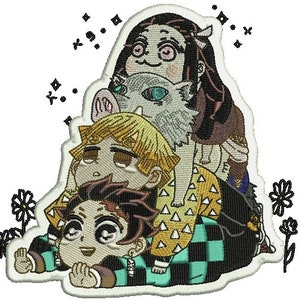 May include: An embroidered patch featuring three anime characters from the show Demon Slayer. The characters are Tanjiro Kamado, Nezuko Kamado, and Zenitsu Agatsuma. The patch is white with black outlines and features a yellow, green, and black color scheme.