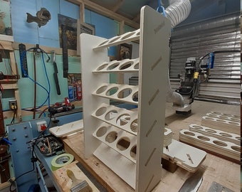 Assemble it yourself! 20 Can Spray Paint Rattle can organizer. Comes with the wall mount cleat.