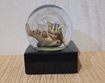 Snow globe &quot;The cat washes&quot;. from Ukraine.