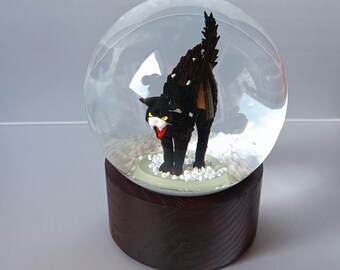 Angry hissing black cat, funny snow globe, wood base. from Ukraine