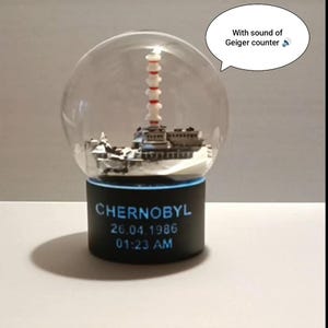 Limited original Chernobyl snow globe© with Sound of dosimetr. Glow in the dark