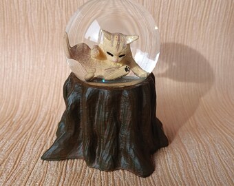 Snow globe &quot;The cat washes on a stump&quot;. from Ukraine.