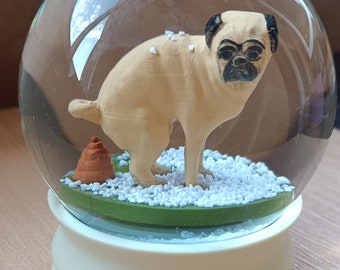 Pug top snow globe