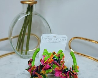 Beautifully designed clay earrings. Each pair is hand-crafted with polymer clay and coated in resin. Hoop flowers pedal earrings.