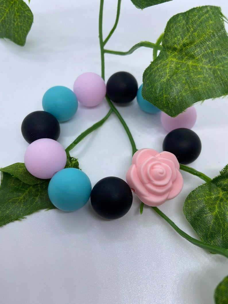 Pink flower power teether