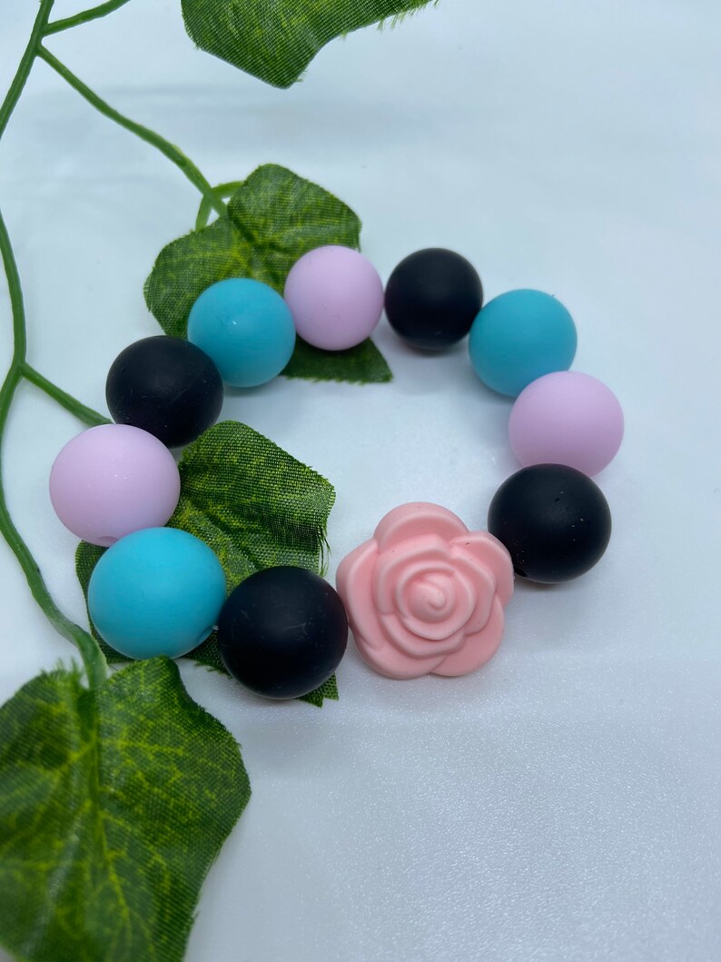 Pink flower power teether
