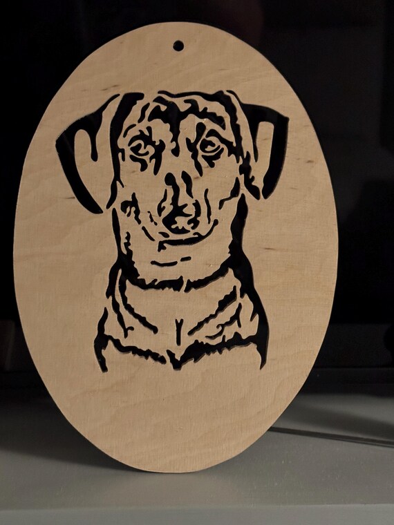 scroll-cut Dachshund wall plaque silhouette style