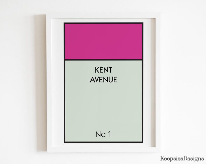 May include: A framed rectangular wall art print featuring a magenta horizontal bar at the top, a light grey background, and black text that reads KENT AVENUE and No 1. The design is enclosed in a simple white frame with a thin black border.