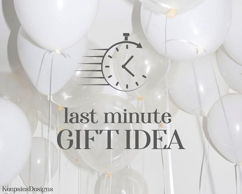May include: White balloons fill the frame, some opaque and others transparent. A black clock graphic with a speeding arrow is centered above the words "last minute GIFT IDEA" in a dark gray font. The text "KeepsiesDesigns" is in the bottom left corner.