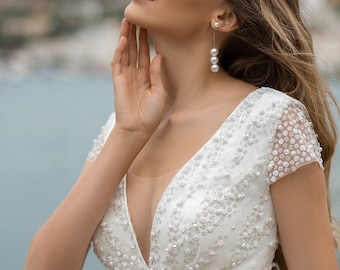 Deep V neck A line Wedding Dress decorated with Pearls , Tulle Wedding Dress with Long Train