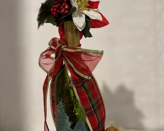 recycled wine bottle with a Christmas Scene,with a little girl & her doll.