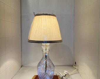 Beautiful home made Lamp from a cut glass decantor.has angel lites as well