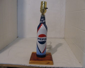 Homemade Accent lamp from Aluminum Pepsi bottle.Beautiful Red white and blue.They don't make them anymore.