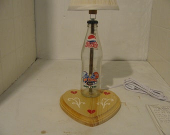 Recycled old Pepsi bottle into a nite lite.Has a date on it 1996-2006 & a decal