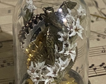 Steam punk gears with swallow bird terrarium