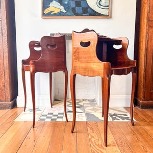 A Pair Of Vintage French Bedside Cabinets With Cutout Handles