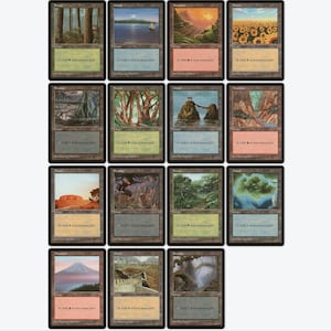 May include: Sixteen Magic: The Gathering trading cards are displayed. Each card showcases a different landscape illustration, such as forests, mountains, and water. The cards have a vintage look with a brown border and text at the bottom.