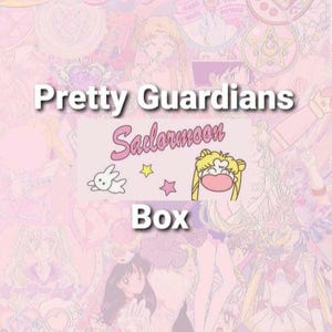 May include: A pink and white Sailor Moon themed box with the text "Pretty Guardians Sailor Moon Box". The box features images of Sailor Moon characters and stars.