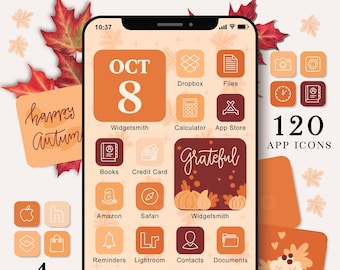 May include: A smartphone screen display featuring an autumn-themed interface with orange and brown app icons, widgets, and wallpapers. The screen shows text including OCT 8, Grateful, and various app labels like Amazon, Safari, and Spotify.