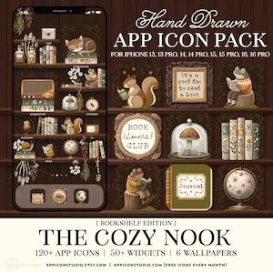 May include: A digital app icon pack with a cozy bookshelf theme. The image features a phone screen displaying app icons, widgets, and wallpapers. The design includes illustrations of a fox, squirrel, frog, books, and a globe. Text reads "Hand Drawn APP ICON PACK" and "THE COZY NOOK."