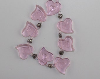 hearts and daisies glass beads; multiple lots in this listing