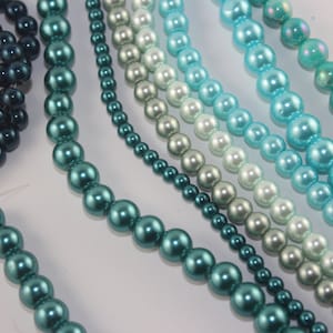 lot of tinted pearls in blue and green shades, mixed sizes