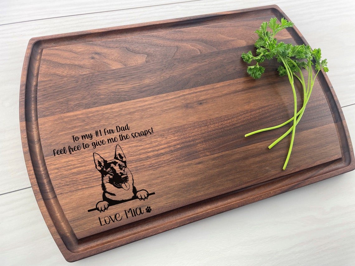 Custom dog engraved wood cutting board for Father's Day.