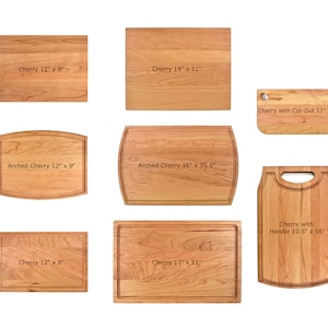 May include: A set of nine wooden cutting boards in various sizes and shapes, including rectangular, arched, and with a handle. The boards are made of cherry wood and have dimensions labeled in inches.