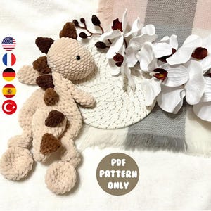 Dinosaur comforter. Cute snuggler. Dinosaur. Amigurumi. Crochet. PDF. Animal. Plush. Baby security blanket. Easy. Lovey. Dragon