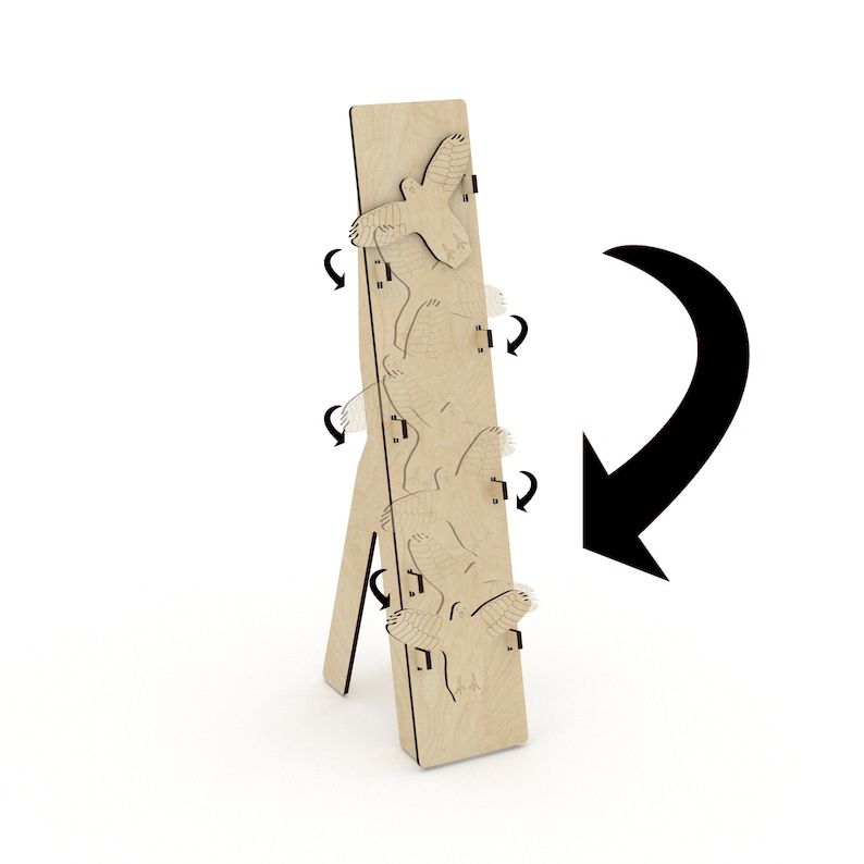 May include: Wooden easel with a series of cutout owls, each with a different pose, rotating on a vertical axis.