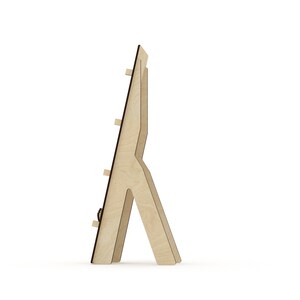 May include: A wooden easel stand with a light brown finish. The easel has a triangular base and a vertical support for displaying artwork or photos.