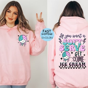 May include: Pink hoodie with a volleyball graphic and the text "If you want a soft serve get some ice cream" on the back.