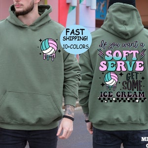 May include: A green hooded sweatshirt with a volleyball graphic and the text "If you want a soft serve get some ice cream" in pink and blue lettering.