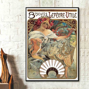 May include: A vintage poster advertising "Biscuits Lefèvre-Utile" featuring an Art Nouveau style illustration of a woman holding a plate of biscuits. The poster is framed in black and features the year 1897.