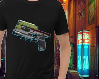 May include: A black t-shirt with a graphic of a futuristic gun with the text "SKIPPY" and "2-0-7-7" printed on it.