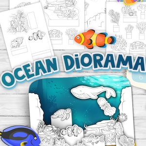 May include: An "Ocean Diorama" craft kit with illustrations of marine life, including a whale, clownfish, and coral reef elements. The kit also features a blue and yellow fish and a purple and orange fish. The text "Ocean Diorama" is visible.