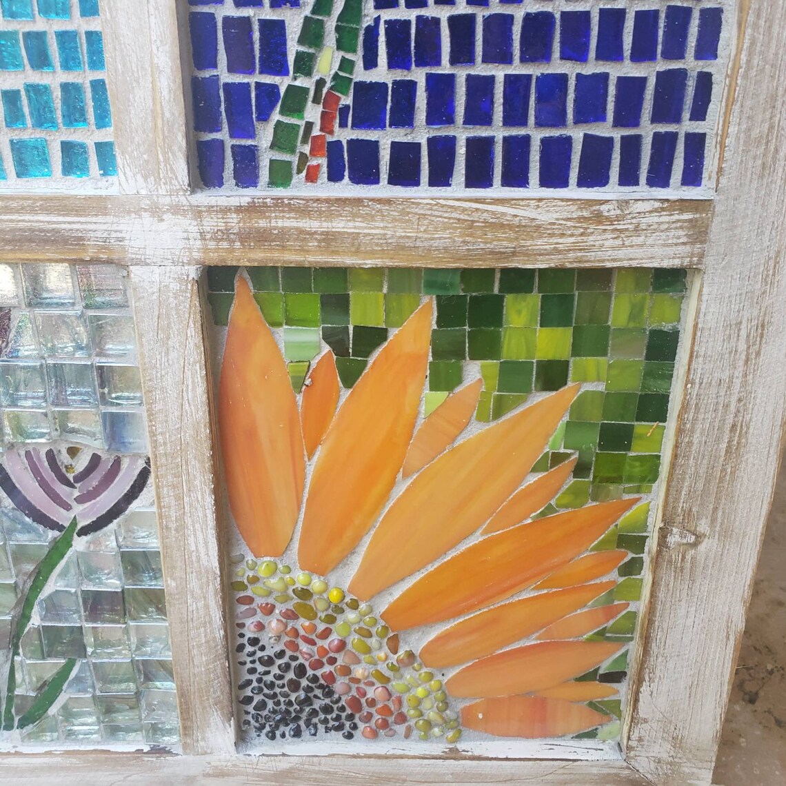 Mosaic stained glass flowers in a window. Etsy