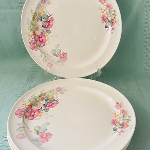 Set of 4  Taylor Smith and Taylor Plates
