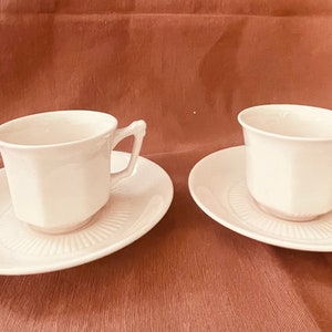 2 sets of cups and saucers by Adam’s China in the Princess Pink pattern