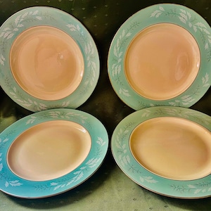Set of 4 dinner plates by Homer Laughlin in the Romance pattern