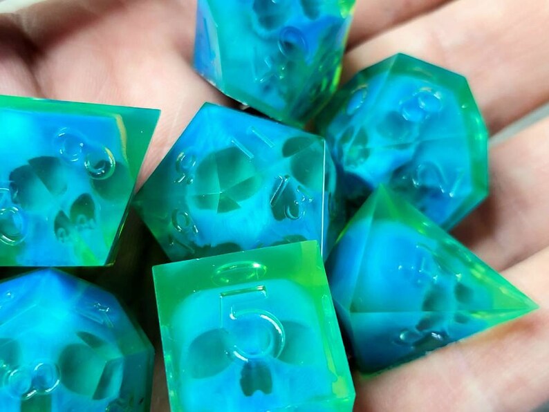 Dnd dice set with blue skull inside and neon green resin