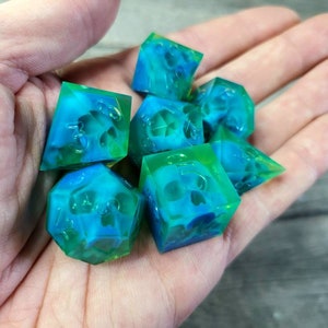 Dnd dice set with blue skull inside and neon green resin