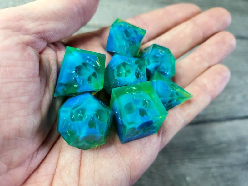 Dnd dice set with blue skull inside and neon green resin