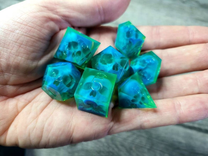 Dnd dice set with blue skull inside and neon green resin