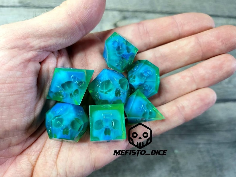 Dnd dice set with blue skull inside and neon green resin