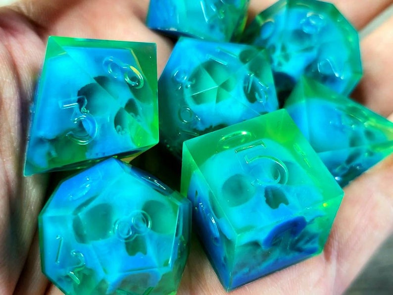 Dnd dice set with blue skull inside and neon green resin