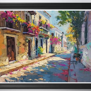 May include: Oil painting of a European street scene with buildings in shades of yellow, white, and blue. Balconies are adorned with vibrant pink and yellow flowers. The street is bathed in sunlight, with shadows and colorful brushstrokes.